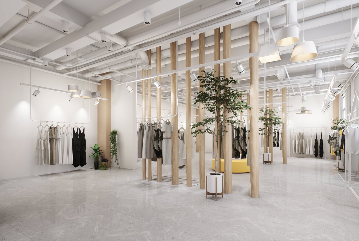 Modern Minimalist Clothing Store Interior with Industrial Ceilings and Natural Wood Accents