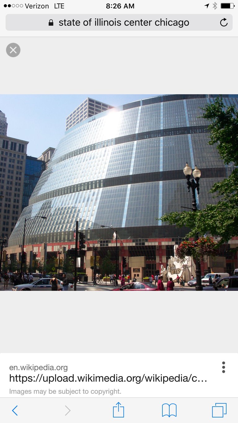 State of Illinois Center building in Chicago featuring distinctive curved glass and metallic facade